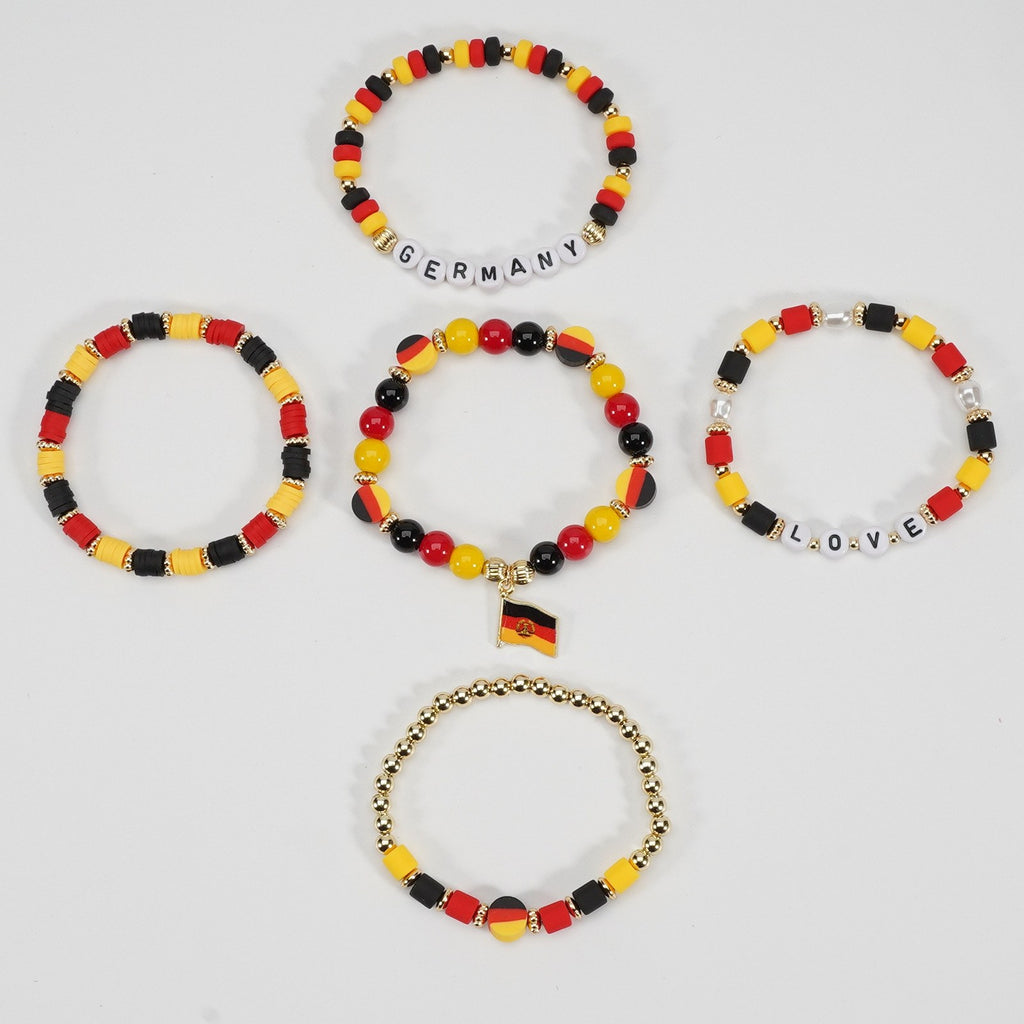 Set of beaded bracelets with German flag design on a white background
