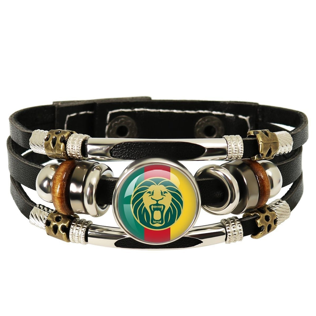 Multistrand bracelet with lion emblem and Rastafarian colors on a white background