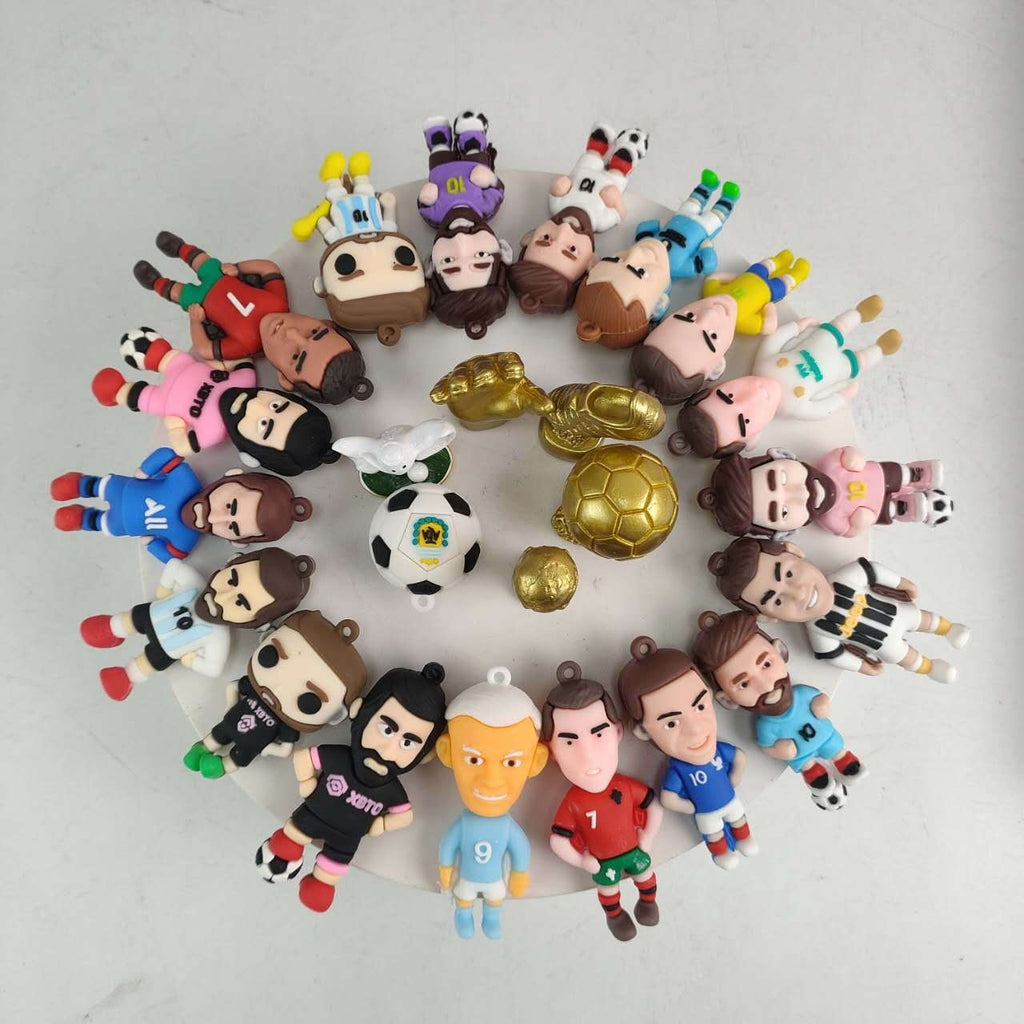 Collection of colorful figurines and soccer balls arranged in a circular pattern on a light gray background.